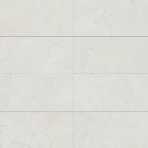 Refined 12x24 matte porcelain tile in a soft white hue with cross-cut details, offering a natural stone look perfect for contemporary interiors.