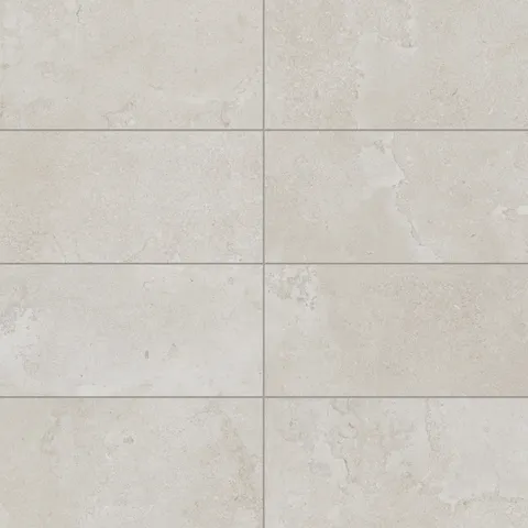 Soft 12x24 matte porcelain tile in a warm beige hue with cross-cut details, creating a natural stone-inspired aesthetic ideal for timeless interiors.