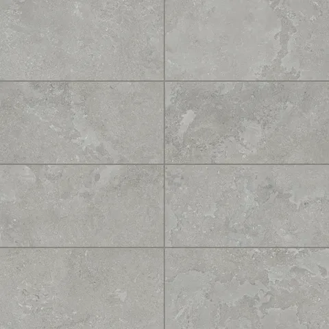Elegant 12x24 matte porcelain tile in an ash-gray tone with subtle cross-cut patterns, evoking a natural stone-like aesthetic for modern spaces.