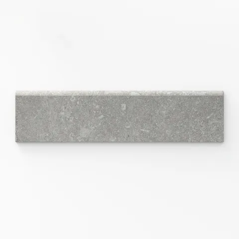 A sleek matte porcelain bullnose tile in ash gray, measuring 3x12, ideal for finishing edges with a refined, contemporary look.
