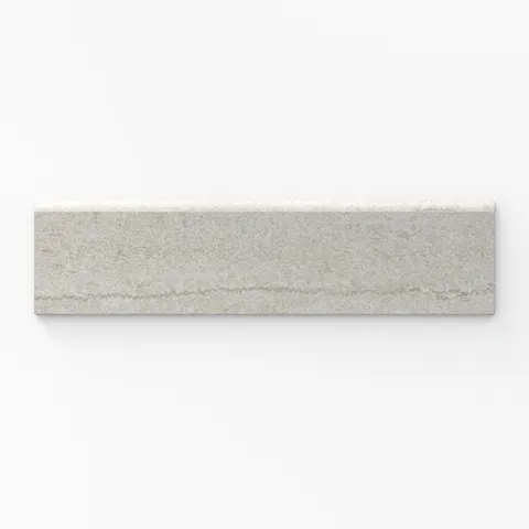 Bullnose porcelain tile with a matte finish, showcasing a light beige hue, 3x12 trim, and vein-cut texture for refined edges.