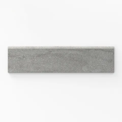 A sleek 3x12 ash grey matte porcelain bullnose trim tile featuring a refined vein-cut design, ideal for creating smooth, polished edges in contemporary interiors.