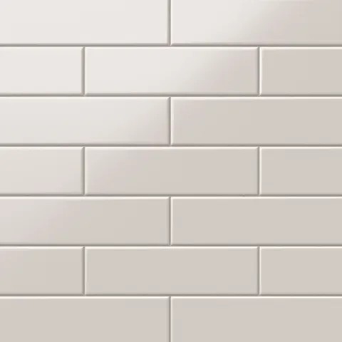 Polly Beige 3x10 satin ceramic tiles offer a soft, matte finish with a neutral tone, ideal for creating timeless, understated elegance in any space.