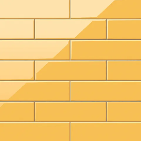 Polly Yellow 3x10 glossy ceramic tiles bring a burst of sunny warmth to interiors, with a reflective finish perfect for lively, cheerful spaces.