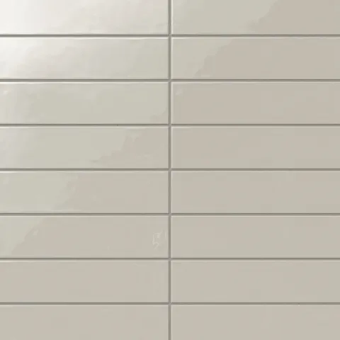Madilyn 3x12 glossy ceramic tile in soft dove gray, boasting a polished finish for a timeless and versatile style.