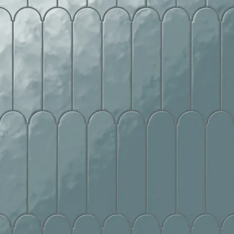 Featuring a soothing fishscale design in glossy blue, these 3c12 tiles bring a serene, aquatic vibe to interiors, enhancing the elegance of any room.