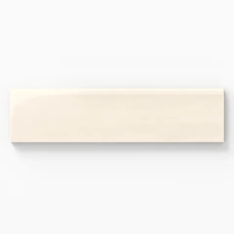 Glossy cream 3x10 bullnose tile, offering a smooth, rounded edge for seamless transitions in tiling projects