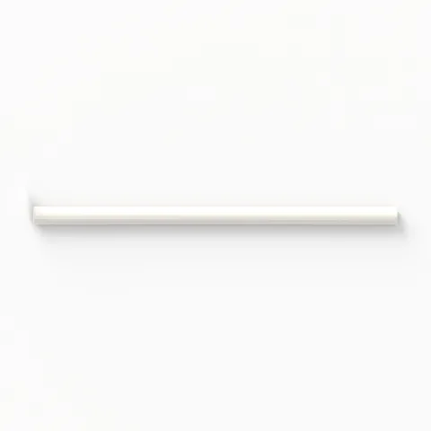 Elegant Jaden Eggshell 0.75x16 pencil tile in a glossy finish, offering a crisp and polished accent for refined design edges.