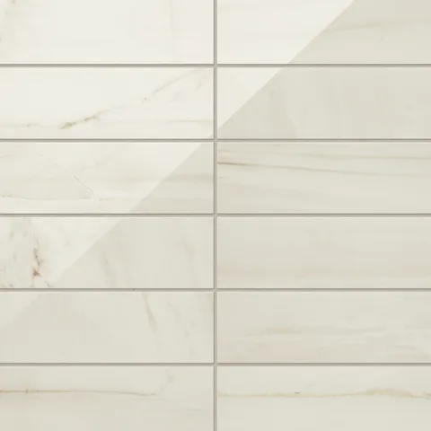 Kendrick Sand 4x12 tiles in a gloss finish, featuring warm beige tones and subtle natural veining for a luminous and elegant appearance.