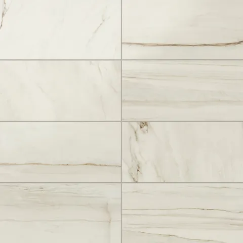 Kendrick Sand tiles in a 12x24 satin finish, showcasing soft beige veining for a warm and natural appearance.
