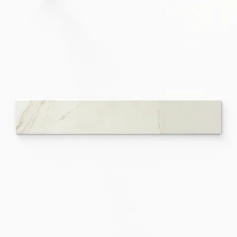 Kendrick Sand 4x24 bullnose tile in a satin finish, offering warm beige hues with soft veining for a refined and polished edge detail.