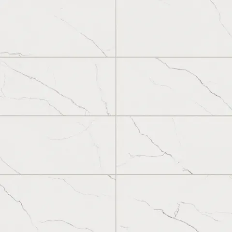Natalia Calacatta Lincoln 12x24 matte tiles featuring a white surface with delicate grey veining for a clean, elegant look.