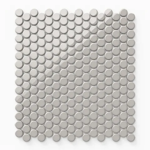 Glossy grey penny round tiles arranged in a radiant mosaic, exuding a clean and versatile style suitable for modern spaces.