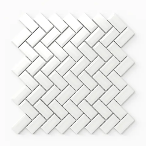 Mabel white herringbone mosaic porcelain tile with a glossy finish, offering a dynamic and elegant geometric pattern