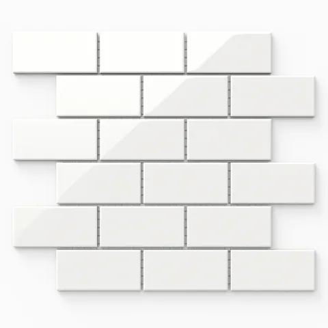 Mabel white brick mosaic porcelain tile in a glossy finish, featuring a classic subway pattern for a sleek and versatile design