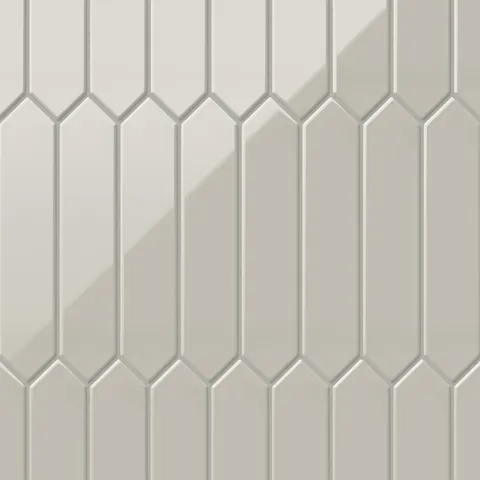 The refined, glossy beige 2x10 picket tiles present a chic geometric aesthetic, making them a perfect choice for contemporary and stylish interiors.