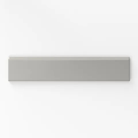 Matte taupe bullnose tile with a soft, neutral tone, perfect for adding a subtle and contemporary edge to interior designs.