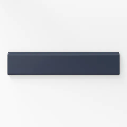 Matte blue bullnose tile in a deep blue tone, perfect for creating a sleek and elegant edge in contemporary interiors