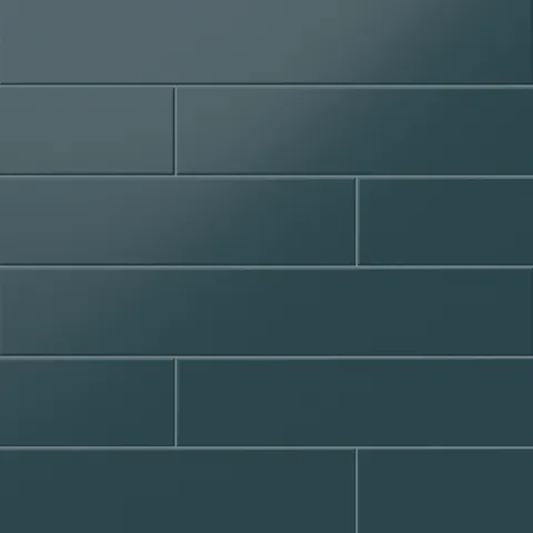 Matte blue subway tiles in a striking 4x24-inch size, offering a vibrant and contemporary look for bold interior designs.