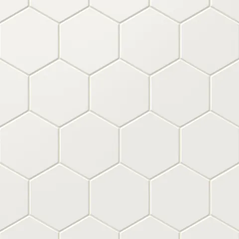 Matte white hexagon tiles in a 5x6-inch format, offering a clean geometric design perfect for timeless and versatile spaces.