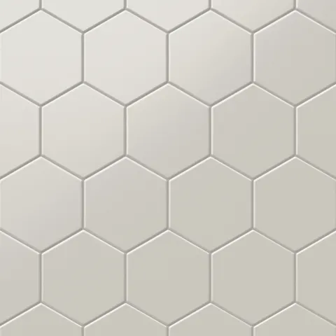 Matte beige hexagon tiles in a 5x6-inch format, delivering a soft and modern geometric pattern for versatile interior designs.