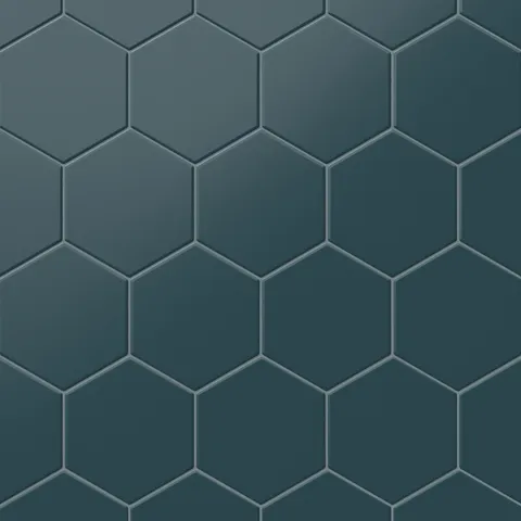 Matte blue hexagon tiles in a 5x6-inch format, providing a bold and vibrant geometric design perfect for modern interiors.