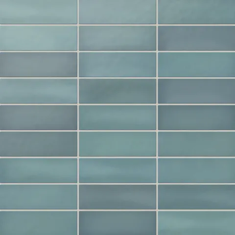 Ellie matte subway tiles in serene aqua blue tones, showcasing a smooth, handmade finish ideal for modern and tranquil spaces