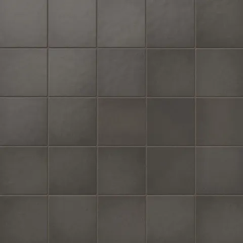Elegant 5x5 matte ceramic tiles in deep smoke-gray hues, adding a dramatic yet refined touch to modern interiors