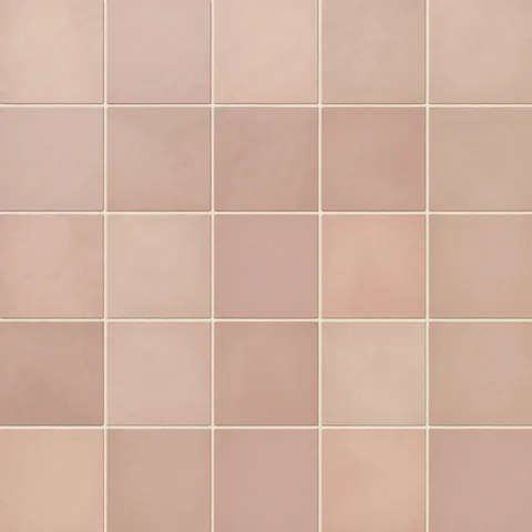 Ellie matte ceramic square tiles in warm pink and beige tones, perfect for adding subtle elegance to walls or floors