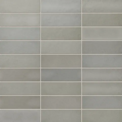 Ellie matte ceramic subway tiles in soothing gray-brown tones, perfect for creating a serene and natural ambiance in any space
