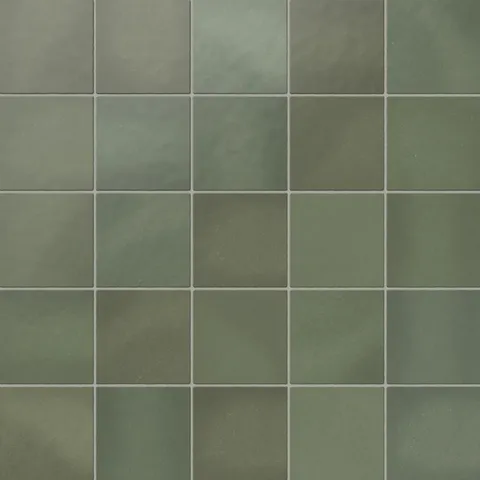 Deep moss green 5x5 matte square tiles with a smooth surface and rich tonal variation, adding natural elegance to any space
