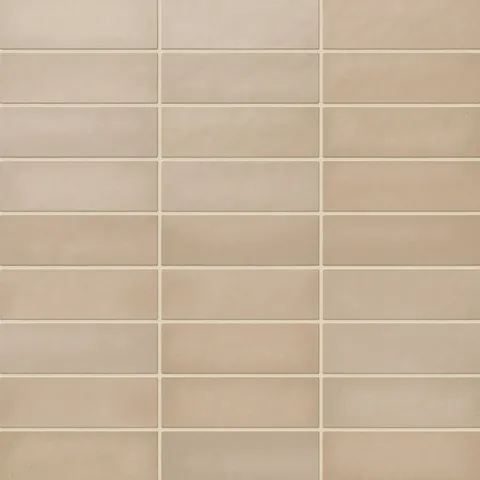Ellie matte ceramic subway tiles showcasing natural beige tones, ideal for neutral and inviting interior designs