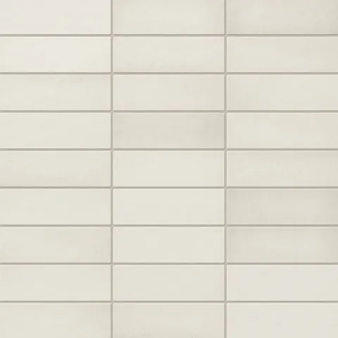 Ellie ceramic subway tiles in soft off-white tones with a matte finish, offering a timeless and versatile design