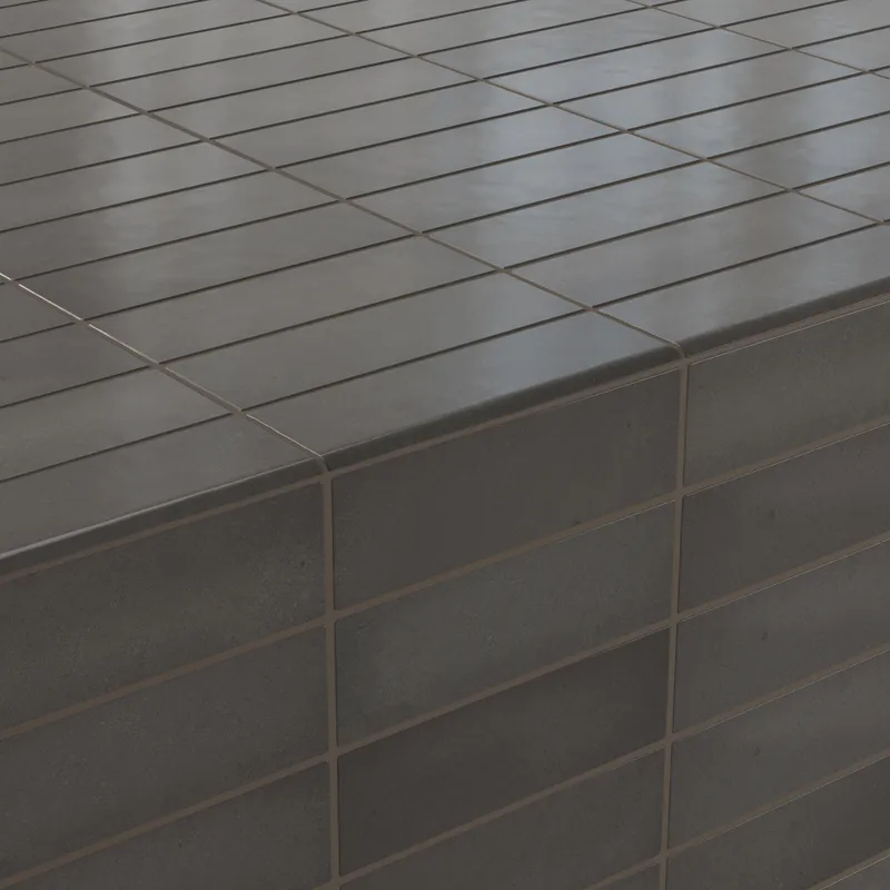 Elegant dark grayish-brown bullnose tiles with a smooth matte finish, seamlessly applied to create a modern corner design
