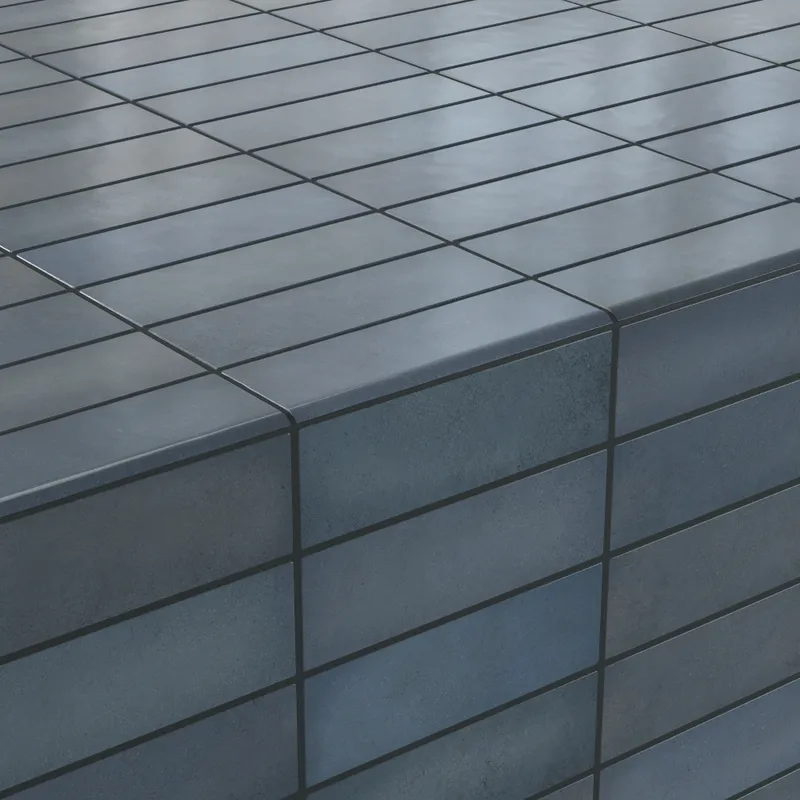 Chic denim-blue 2.5x8 matte tiles with sleek bullnose edges, creating a seamless and modern corner finish