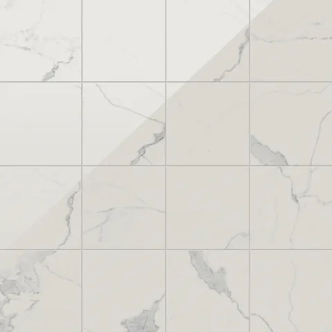 Leona 12x12 polished porcelain tile in Calacatta, showcasing elegant white marble patterns with subtle gray veining.