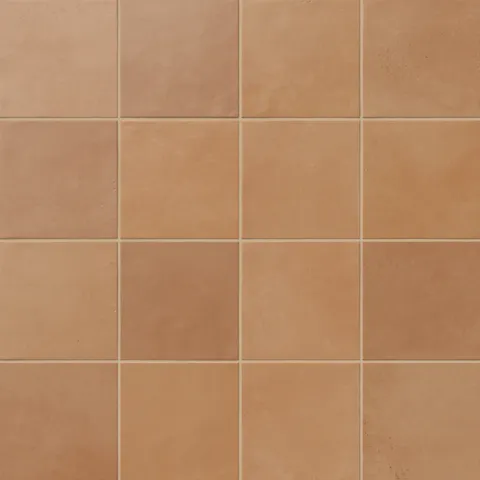 Brown porcelain tiles featuring a natural, handcrafted texture and earthy shading.