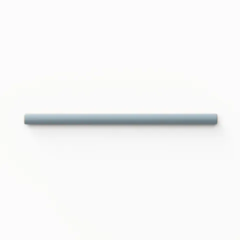 Glossy ocean blue quarter-round porcelain tile, measuring 0.5x8 inches, ideal for accentuating edges and providing a seamless, polished finish
