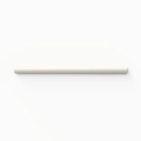 Maisie porcelain quarter-round tile in a glossy white finish, featuring a sleek rounded design for refined edges