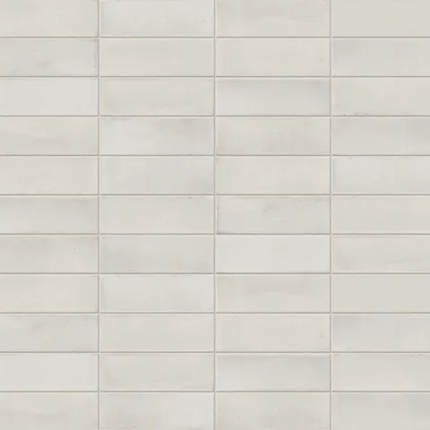 A 2x6 porcelain subway tile in soft off-white, featuring a matte finish, and a clean stacked layout with fine grout lines.