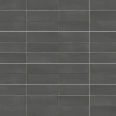 A 2x6 porcelain subway tile in dark gray, featuring a matte finish, and a clean stacked layout with fine grout lines.