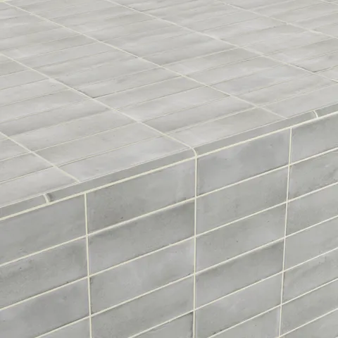 Natasha 0.5 x 8 Jolly Matte Ceramic Tile Trim in Amber Grey