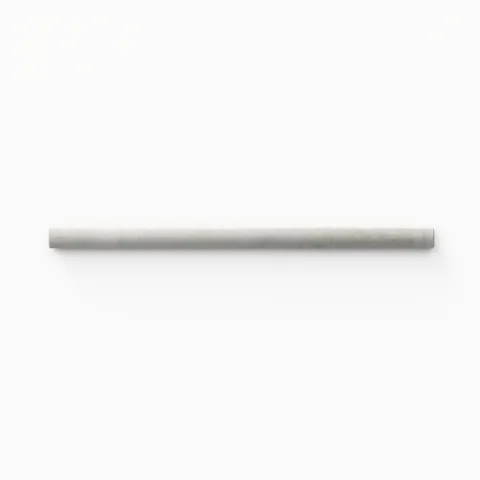 A 0.5x8 ceramic tile trim in light gray, featuring a matte finish, and softly curved profile for elegant edging.
