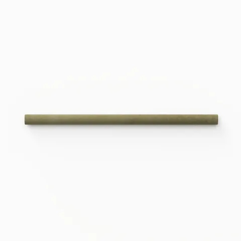 A 1x8 ceramic tile trim in moss green, featuring a glossy finish, and softly curved profile for elegant edging.