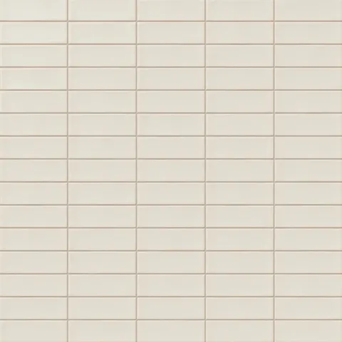 A 1.6x5 ceramic subway tile in warm off-white, featuring a matte finish, and a clean stacked layout with fine grout lines.