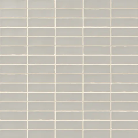 A 1.6x5 ceramic subway tile in light gray, featuring a matte finish, and a clean stacked layout with fine grout lines.