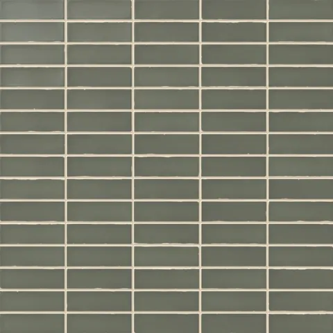 A 1.6x5 ceramic subway tile in muted green, featuring a matte finish, and a clean stacked layout with fine grout lines.