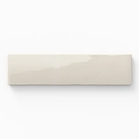 A3x12 ceramic subway tile in off-white, featuring a glossy finish, soft tonal variation, and a clean, flat-edge profile.