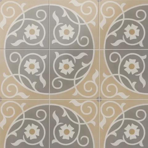 An 8x8 matte porcelain decorative tile featuring floral patterns in soft beige and gray, arranged in a circular quadrant with off-white scrollwork and golden-centered daisies.