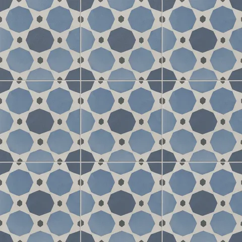 An 8x8 matte porcelain decorative tile featuring interlocking octagons in navy and sky blue, connected by off-white diamonds and charcoal hexagons.